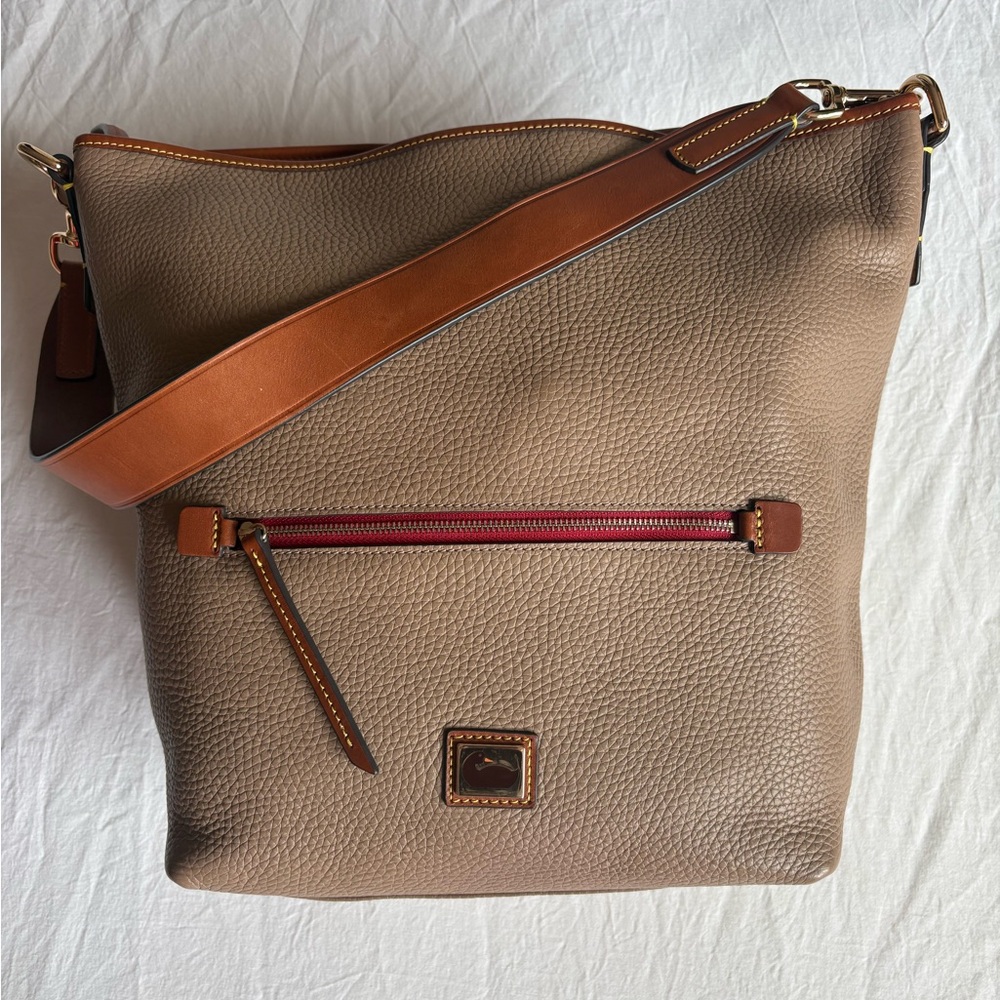 Dooney & Bourke Pebbled Leather color Putty Hobo with Cognac Strap and Red Zip